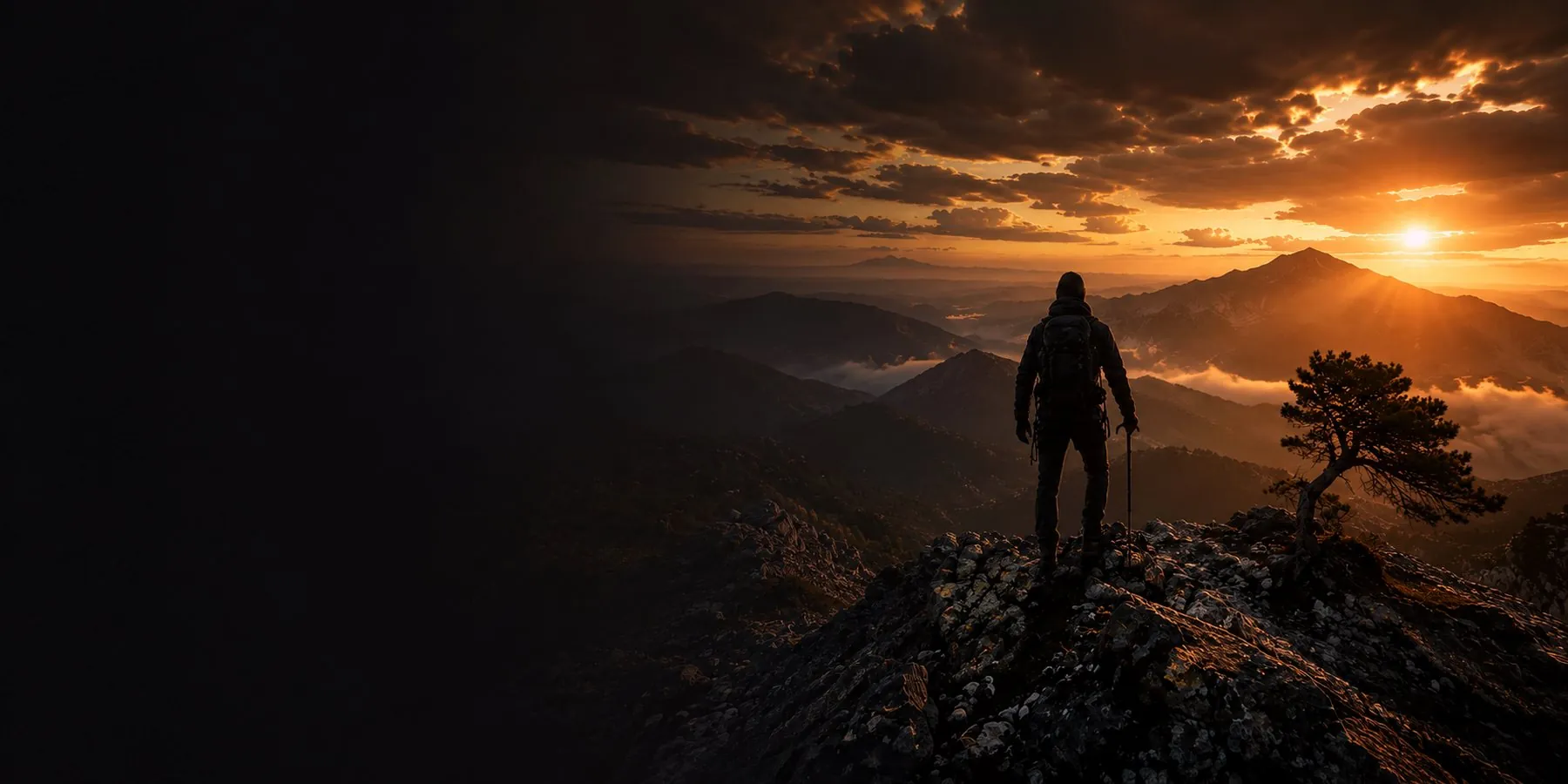 A walker on a ridge in the Troodos mountains at sunrise